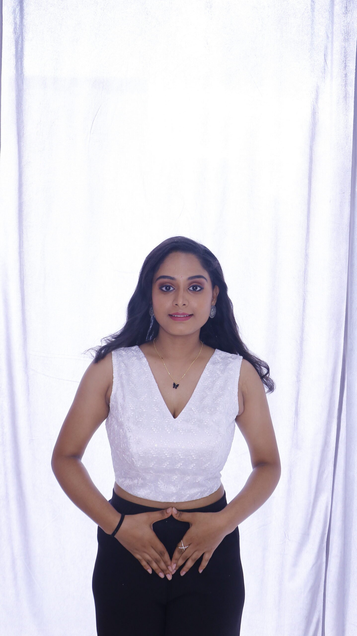 White Sleeveless Blouse