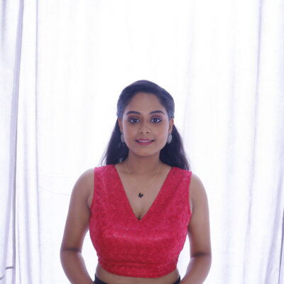 Red sleeveless v neck blouse