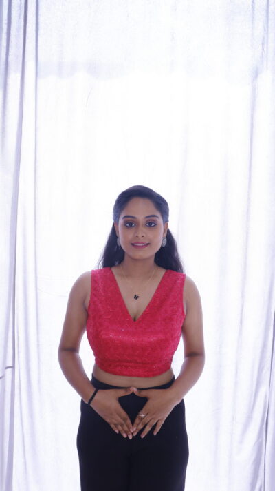 Red sleeveless v neck blouse